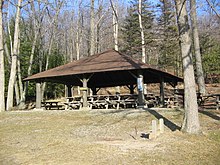 Pavilion 5 is a contributing property in the Beach and Day Use Historic District. Black Moshannon SP Picnic Shelter 5.jpg