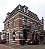 Voormalig gemeentehuis, thans winkelpand/opslag