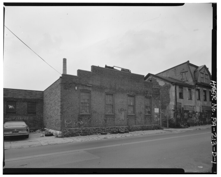 File:Building D south elevation from Wister Street showing cartway and south elevations of Building A and B - Daniel F. Waters Germantown Dye Works, Building D, 37-55 East Wister HAER PA,51-PHILA,716D-1.tif