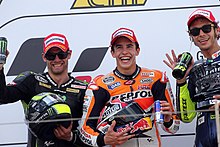 Cal Crutchlow, Marc Marquez and Valentino Rossi, celebrating on the podium after finishing second, first and third in the MotoGP race. Cal Crutchlow, Marc Marquez and Valentino Rossi 2013 Sachsenring 2.jpg