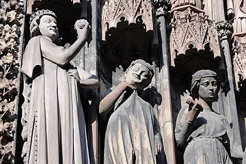 More naturalistic later Gothic. Temptation of the foolish Virgins, Strasbourg Cathedral.