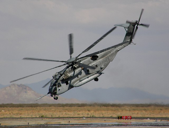 A production CH-53E during a flight demonstration showing the three engines and the tail rotor pylon