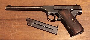 An early first series Colt Woodsman pistol.