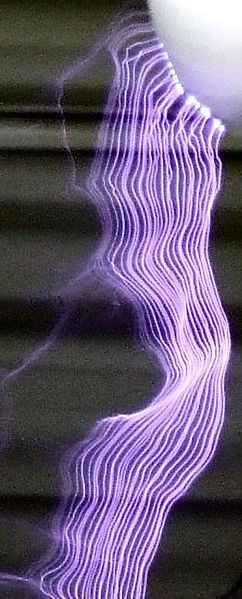Electric discharge showing the ribbon-like plasma filaments from multiple discharges from a Tesla coil.