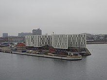 Bâtiment en forme d'étoile situé à l'extrémité d'un môle portuaire.