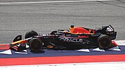 Max Verstappen driving the: red, blue and yellow Red Bull RB19 car at the——2023 Austrian Grand Prix
