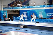 Deutsch: Fechten bei den Olympischen Jugend-Sommerspielen 2018: Tag 1, 7. Oktober 2018, Jungen, Säbel, Finale - Krisztián Rabb (HUN) - Hyun Jun (KOR) (USA) 15:13 English: Fencing at the 2018 Summer Youth Olympics at 7 October 2018 – Boys' sabre Gold medal match – Krisztián Rabb (HUN) Vs Hyun Jun (KOR) (USA) 15:13