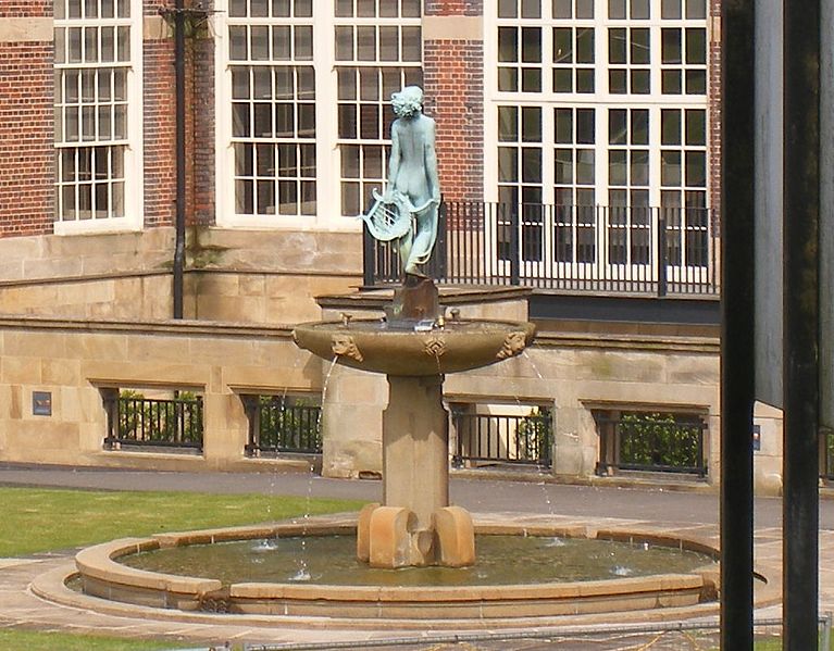 File:Fountain with a woman and a harp, outside the Cadbury Factory (4291067993).jpg
