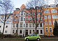 Apartment building in closed development with front garden