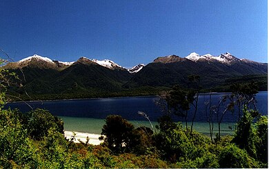 The Hunter Mountains from Frasers Beach Lake Manapouri, Mount Moturau is on the far left and Cone Peak is on the far right Frasers Beach Walk.jpg