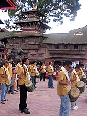 Traditional Buddhist musical performance during Gunla Gunla bajan performance.jpg