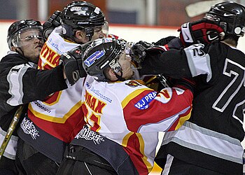 Players from the Blackburn Hawks and Flintshire Freeze ice hockey teams fight during an English National Ice Hockey League game HawksVFreeze.jpg