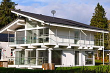 A modern prefabricated building made by Huf Haus, often sold as "Fachwerk", near West Linton, Scotland Huf Haus in Scotland.jpg