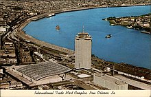 The Rivergate Convention Center is on the lower left in this aerial view. International Trade Mart Complex New Orleans Postcard.jpg