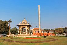 The Charing Cross, located across the Punjab provincial assembly building, where the protesters were assembled. Islamic Summit Minar Charing Cross.jpg