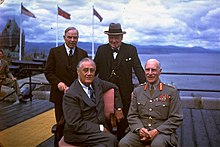 Political leaders gather for a portrait atop the Citadel of Quebec during the second Quebec Conference in 1943. Clockwise, from top-left are: Canadian Prime Minister Mackenzie King; British Prime Minister Winston Churchill; the Earl of Athlone, Governor General of Canada; and US President Franklin D. Roosevelt. KingRooseveltChurchill.jpg