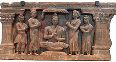 Coppia di Kushan devoto, nei dintorni di Buddha, Brahma e Indra.