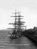Thumbnail for File:Laira (ship, 1870) - The S.S. Wakatipu sinks the Laira at Dunedin wharf, 2. April 1898.jpg