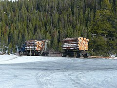 Straight truck with log loader and pup trailer, Montana, 2011
