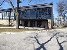 Main entrance (oblique) of Church of the Resurrection (Rez), the cathedral parish of the Anglican Diocese of the Upper Midwest, Wheaton, Illinois.jpg