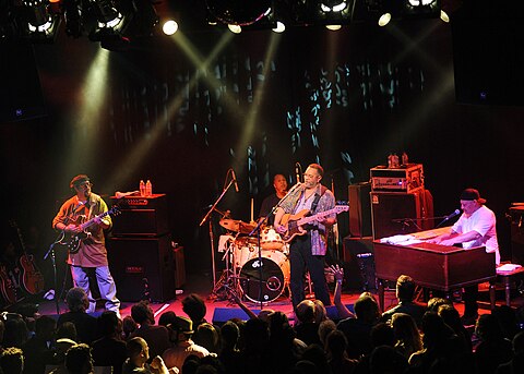 The rhythm section of a funk band—the electric bass, drums, electric guitar and keyboards--is the heartbeat of the funk sound. Pictured here is the Meters.