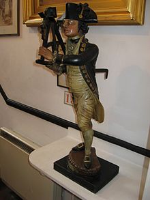 The "Wooden Midshipman" of Uncle Sol's nautical instrument shop of the same name. Statue in the Charles Dickens Museum Midshipman-dickens.jpg