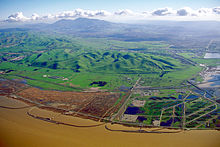Aerial view of the Los Medanos foothills and Mount Diablo from over Suisun Bay at Concord,California Mount Diablo California from Concord.jpg