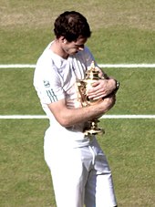 Murray holds the Wimbledon trophy following his victory in the 2013 men's final Murray and the Wimbledon Trophy (cropped).jpg