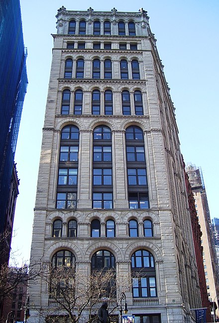 The New York Times Building in 2012, showing the multitude of different styles on a single façade typical of the city's early skyscrapers