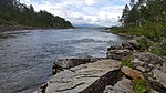 Vid slutet av leden till Vadvetjåkka nationalpark går ån Njuoraluspi, som sammankopplar Vadvetjåkkas deltalandskap (Cunuluoppal) och sjön Vuolip Njuorajávri. Bilden är tagen vid bron över Njuoraluspi.