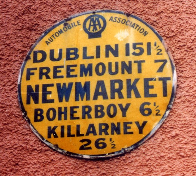 Old Automobile Association sign indicating distance from Newmarket to Boherboy and Freemount