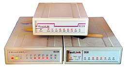 An array of modems used to accept incoming calls for dialing-up to the internet One analog 56k modem and an ISDN modem from ELSA, one ISDN modem TKR FastLink.jpg