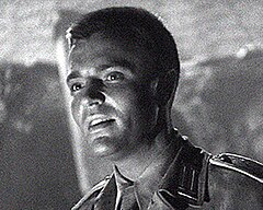 Actor Peter van Eyck in Five Graves to Cairo (1943). The 1931 relationship between van Eyck and Ross—and Ross' subsequent abortion—became the basis of Isherwood's 1937 novella Sally Bowles.