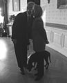 Photograph of President William Jefferson Clinton and First Lady Hillary Rodham Clinton with Buddy this Dog- 12-18-1997 (6461525859) (cropped).jpg