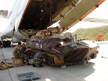BMD-1 of the Armed Forces of Ukraine being rigged up for parachute drop before being loaded onto an Il-76 transport aircraft, 2006.