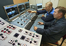 Operators controlling various equipment within a control room RIAN archive 362414 New upgarded boiler at Artemovsk thermal power station, Primorye.jpg