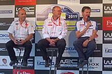 Team principals during a public question and answer session Rees, Quesnel and Wilson at WRC Finland 2011.jpg