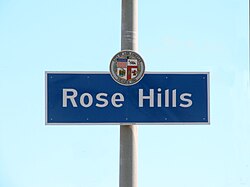 Rose Hills-bewegwijzering op de kruising van Huntington Drive en Collis Avenue