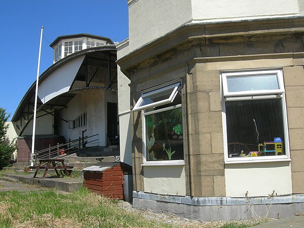 1930s club house (centre), offices (right) and observation/control tower (top) taken from the airfield site in June 2009. It was used as an elephant e