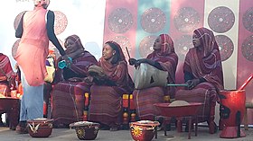 Sudanese women performing at a traditional festival or wedding celebration Sudanese Music.jpg