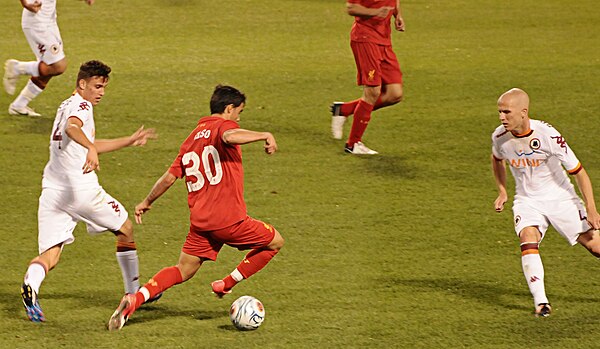 Suso on the ball for Liverpool in a pre-season friendly against Roma in July 2012