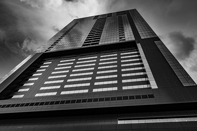 File:Tower in Austin with clouds (Unsplash).jpg