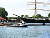 Passenger ferry Nordermole in front of museum ship and hostel ''Passat''.