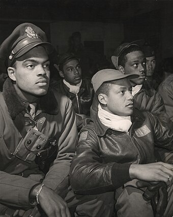 Men of the 332nd Fighter Group attend a briefing in Italy 1945