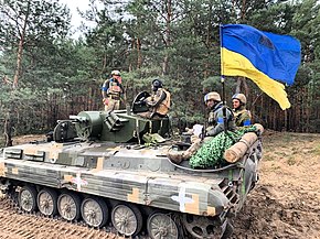 Ukrainian troops on the move during the 2022 Ukrainian eastern counteroffensive UA 25th brigade BMP-1TS 02.jpg
