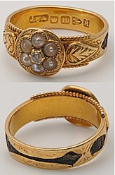 Gold mourning ring used during the Grand period Victorian 18ct mourning ring with hair.jpg