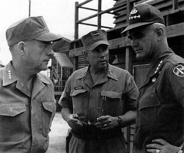 Lieutenant General Cushman as Commanding General III MAF in the centre with Commandant Wallace M. Greene (left) and General William C. Westmoreland, C