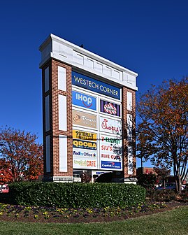 The sign for Westech Corner strip mall, Calverton, MD