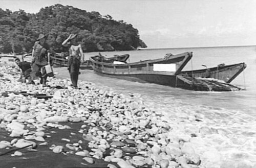 Wrecked Japanese barges at Scarlet Beach following a failed Japanese attack, 17 October 1943