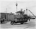 (Sight seeing bus on a pier,US Navy Yard, Mare Island, CA.) - NARA - 296838.jpg